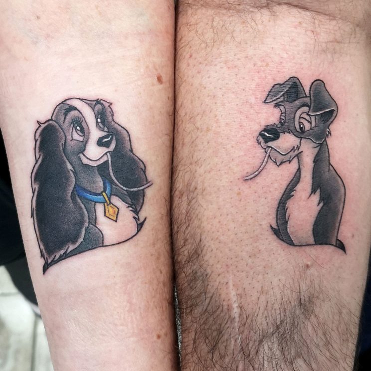 Matching couples tattoos of Lady and the Tramp sharing a string of spaghetti.