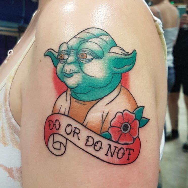 Traditional style Yoda with banner that reads "Do or Do Not".